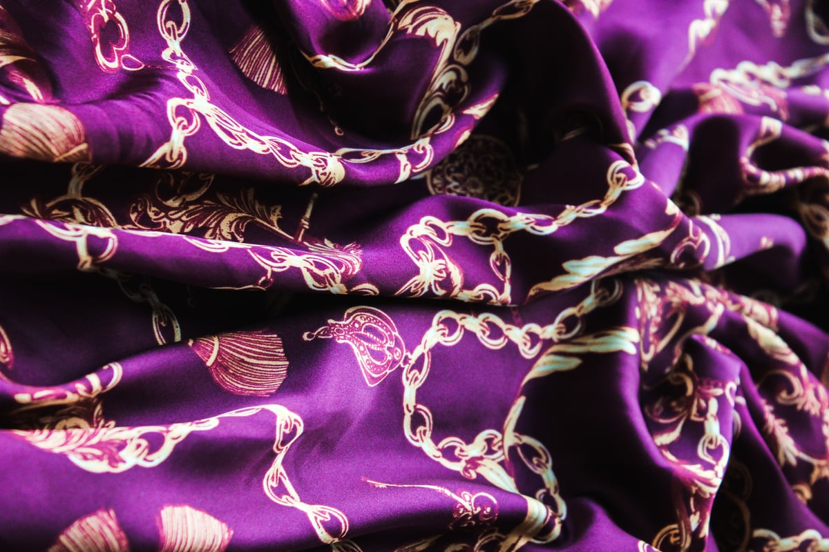 high end purple silk with gold chain pattern